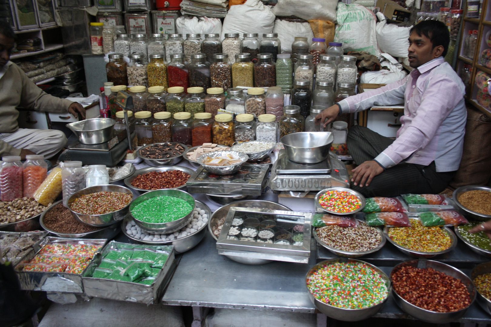 Vibrant traditional textiles and spice bazaars in the shadow of Rajasthan fortresses