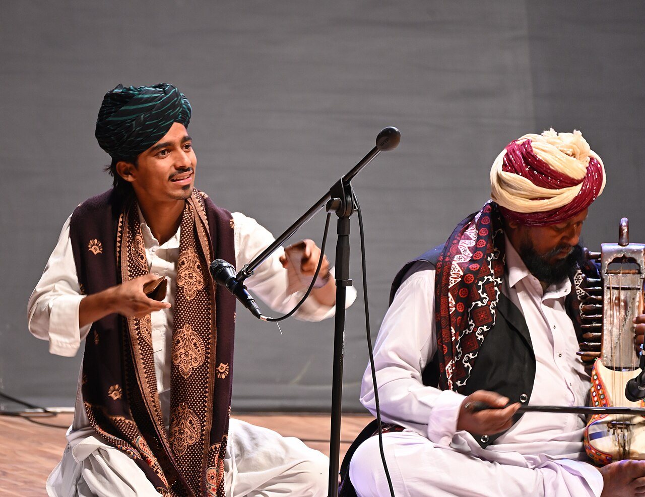 Traditional Manganiyar and Langa folk musicians performing with sarangi in the Thar desert