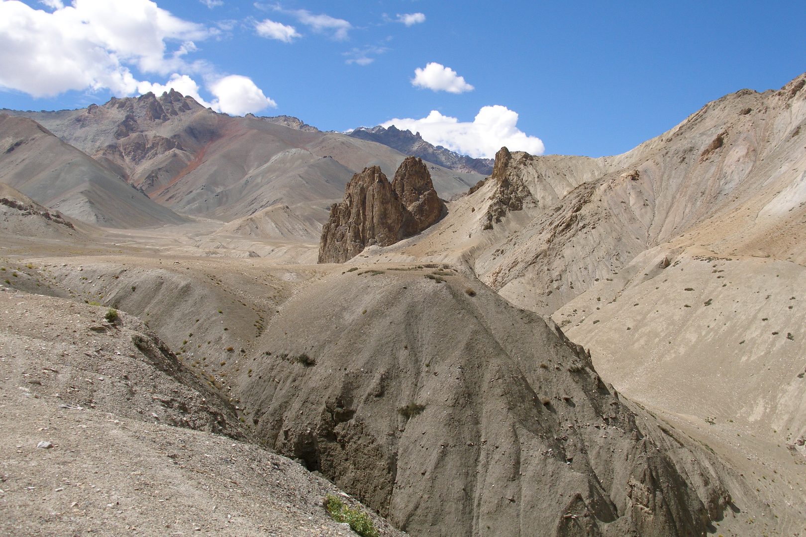 Stark high-altitude desert plateaus and rugged snow peaks of Ladakh