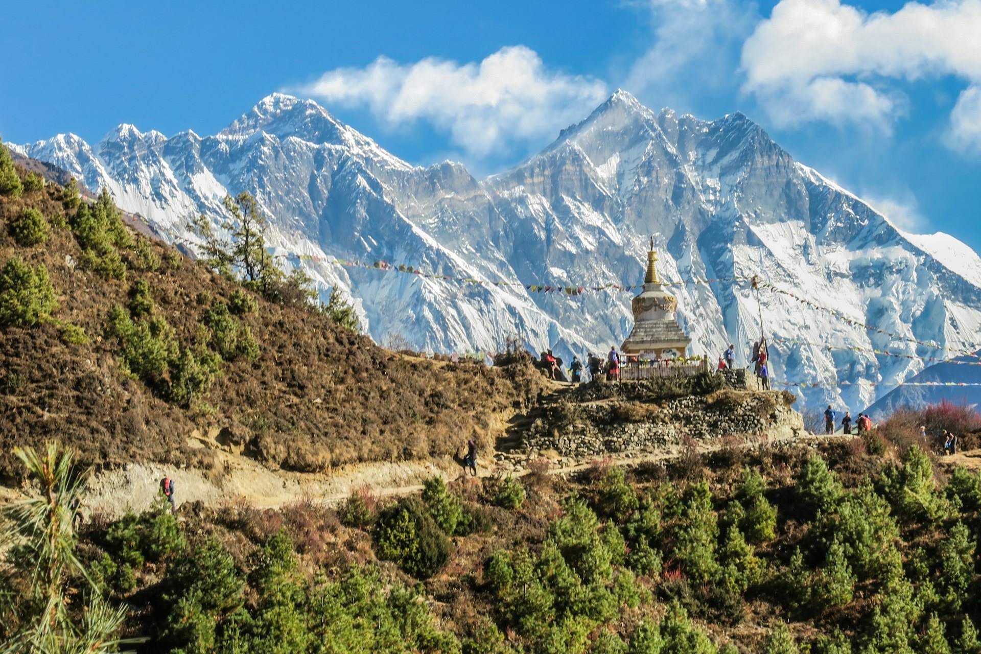 Majestic high-altitude Himalayan monastery shrouded in mist and mountain clouds