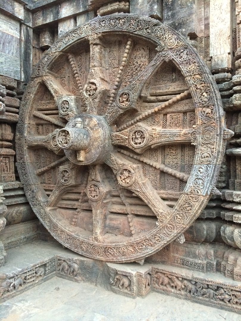 Iconic intricately sculpted stone wheel of the Sun Temple at Konark Odisha