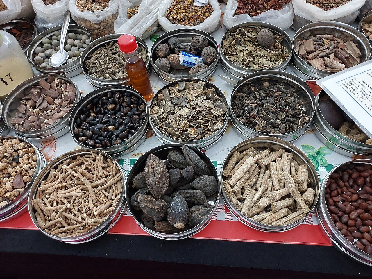 Traditional Ayurvedic medicinal herbs, therapeutic botanical oils, and healing preparations