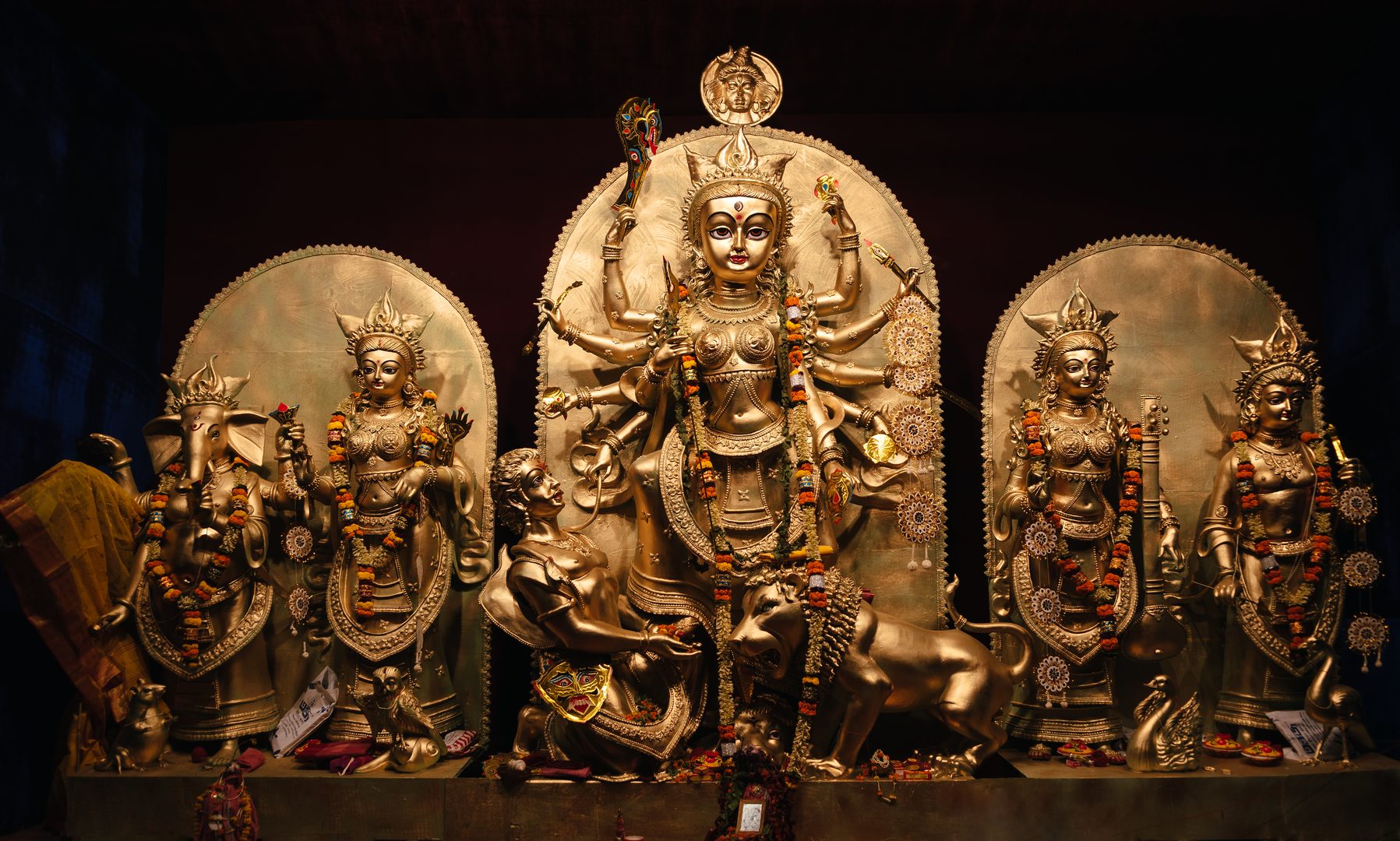 Grand architectural Durga Puja celebration with illuminated temple pavilions in Kolkata