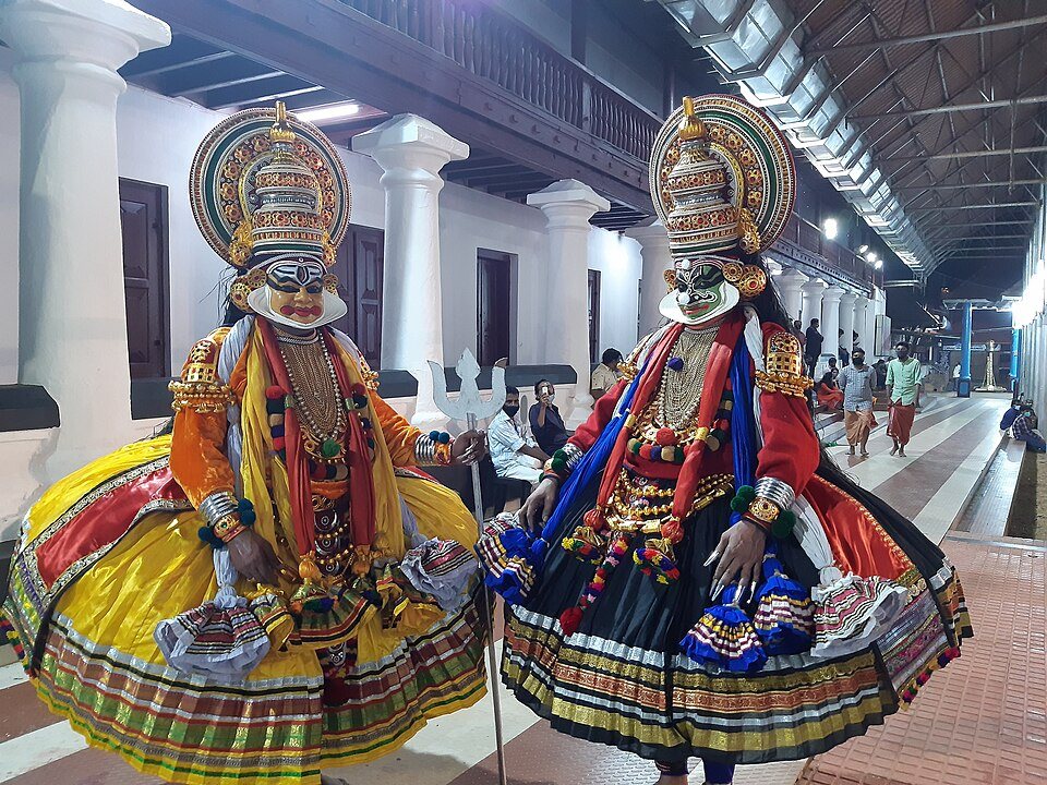 Kathakali classical dance artist in elaborate traditional makeup and costume in Kerala